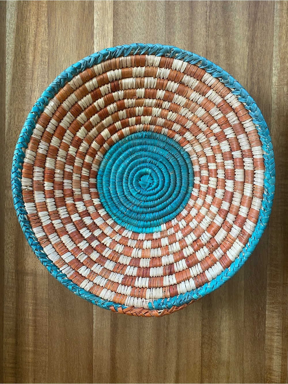 9.5” Handwoven Turquoise, Orange & Cream Decorative Basket